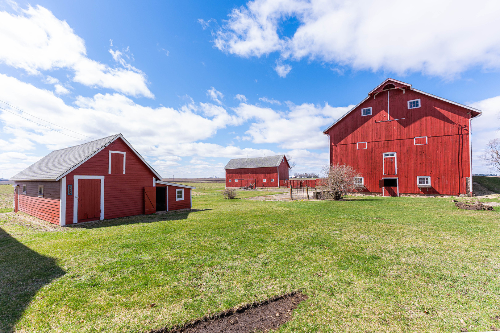 23659 Malta Road Malta, IL 60150 - Photo 86 of 111 a view of a big house with a big yard and a large tree