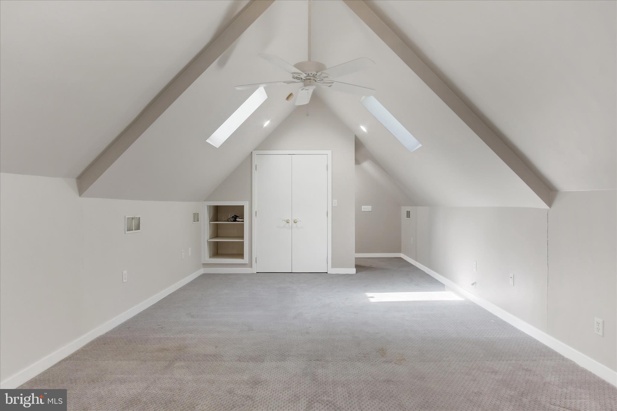 1855 Westwood Road York, PA 17403 - Photo 40 of 60 an empty room with a ceiling fan and closet area