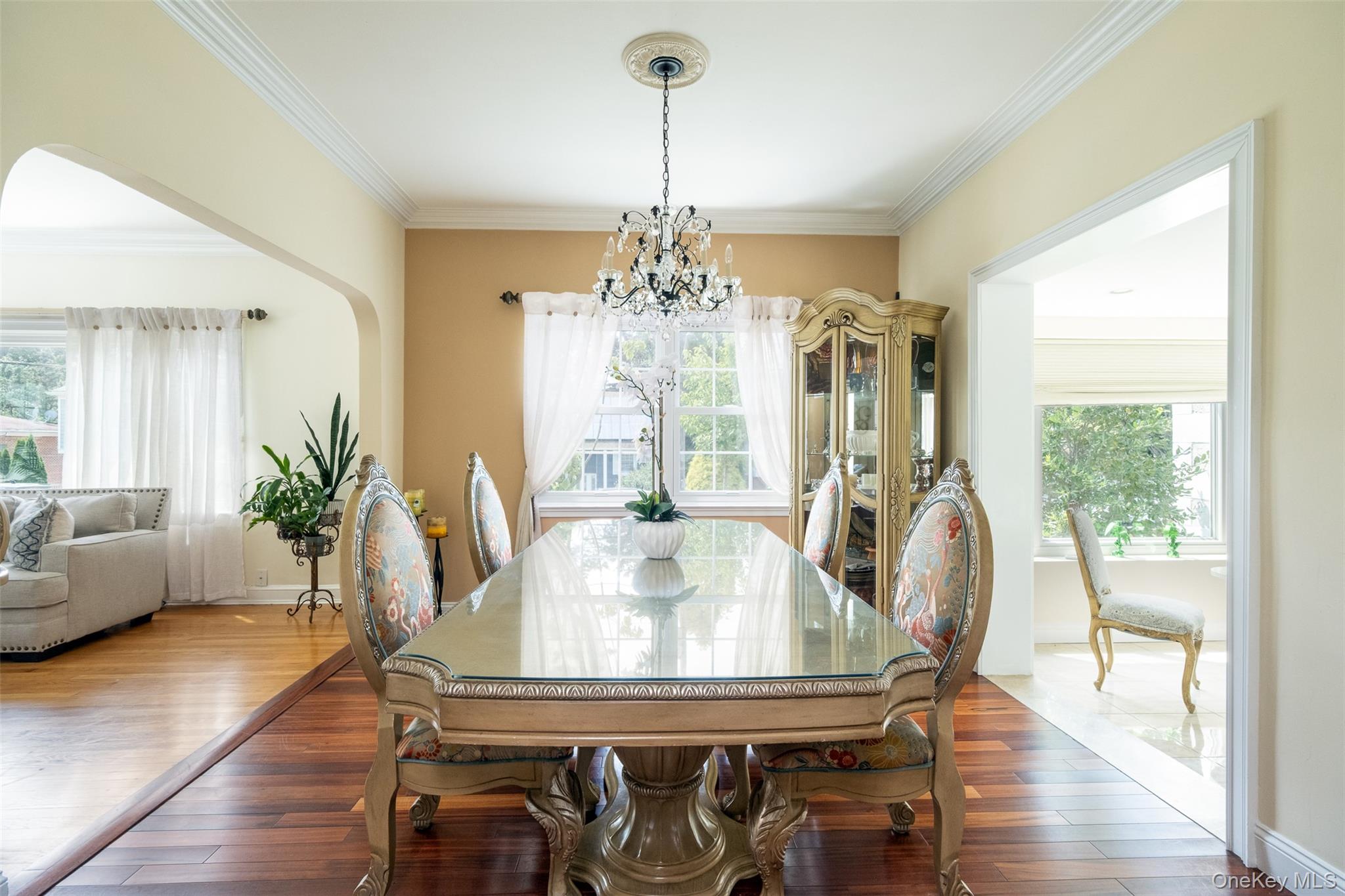 982 Split Rock Road Pelham, NY 10803 - Photo 11 of 33 a view of a dining room with furniture window and wooden floor