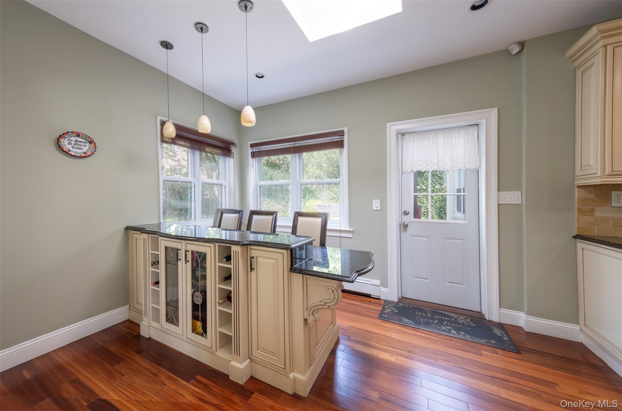 982 Split Rock Road Pelham, NY 10803 - Photo 8 of 33 a view of a dining room with furniture window and wooden floor
