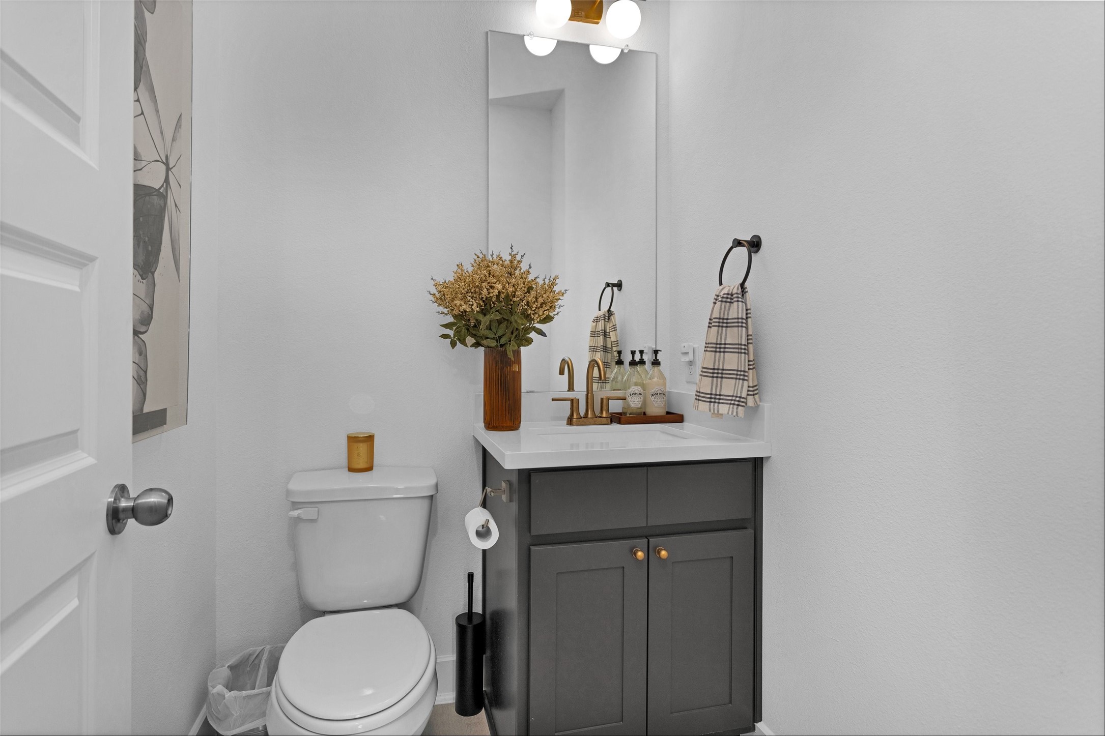 108 Stephens Rdg Lane Montgomery, TX 77316 - Photo 14 of 50 a bathroom with a sink a toilet and mirror