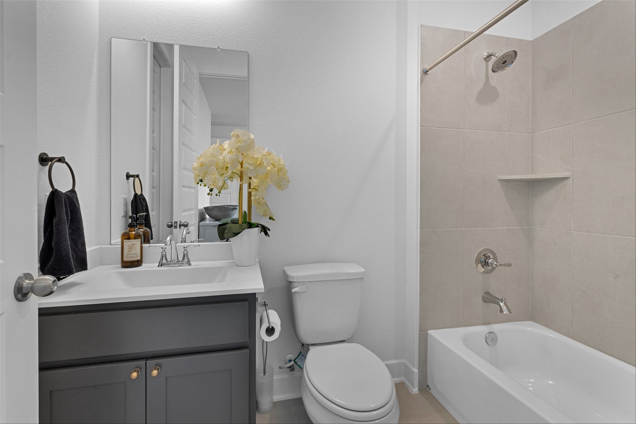 108 Stephens Rdg Lane Montgomery, TX 77316 - Photo 31 of 50 a bathroom with a sink vanity mirror and toilet