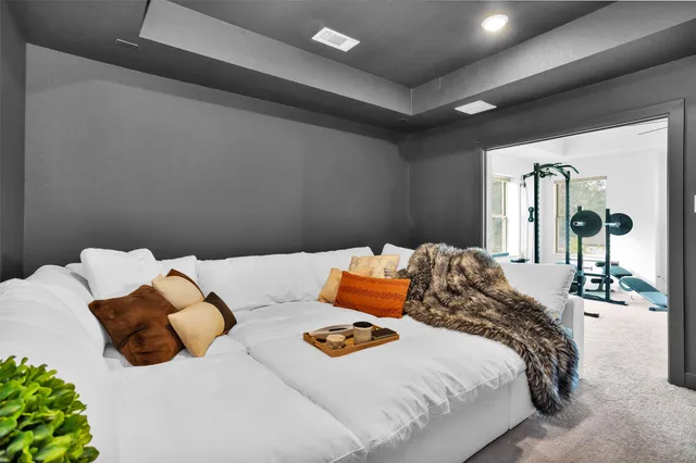 a view of a hallway with seating area