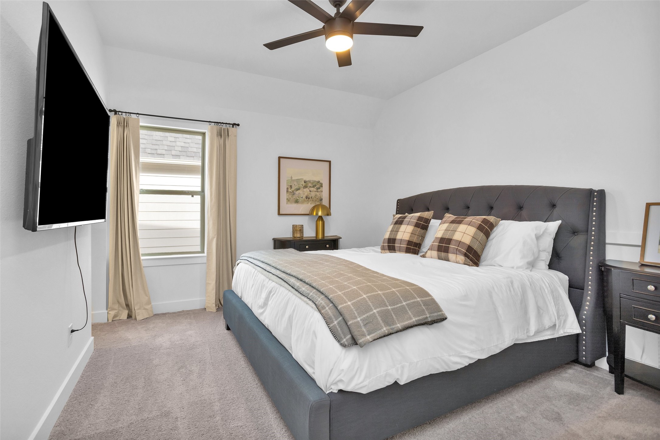 108 Stephens Rdg Lane Montgomery, TX 77316 - Photo 38 of 50 a bedroom with a bed and a ceiling fan