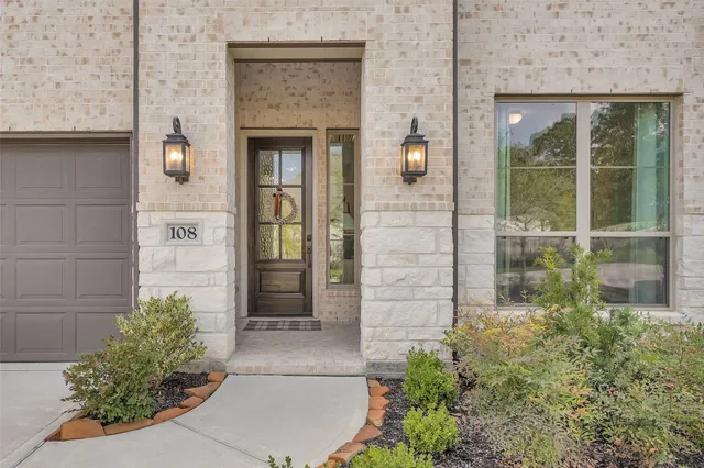 a view of potted plant in front of a door