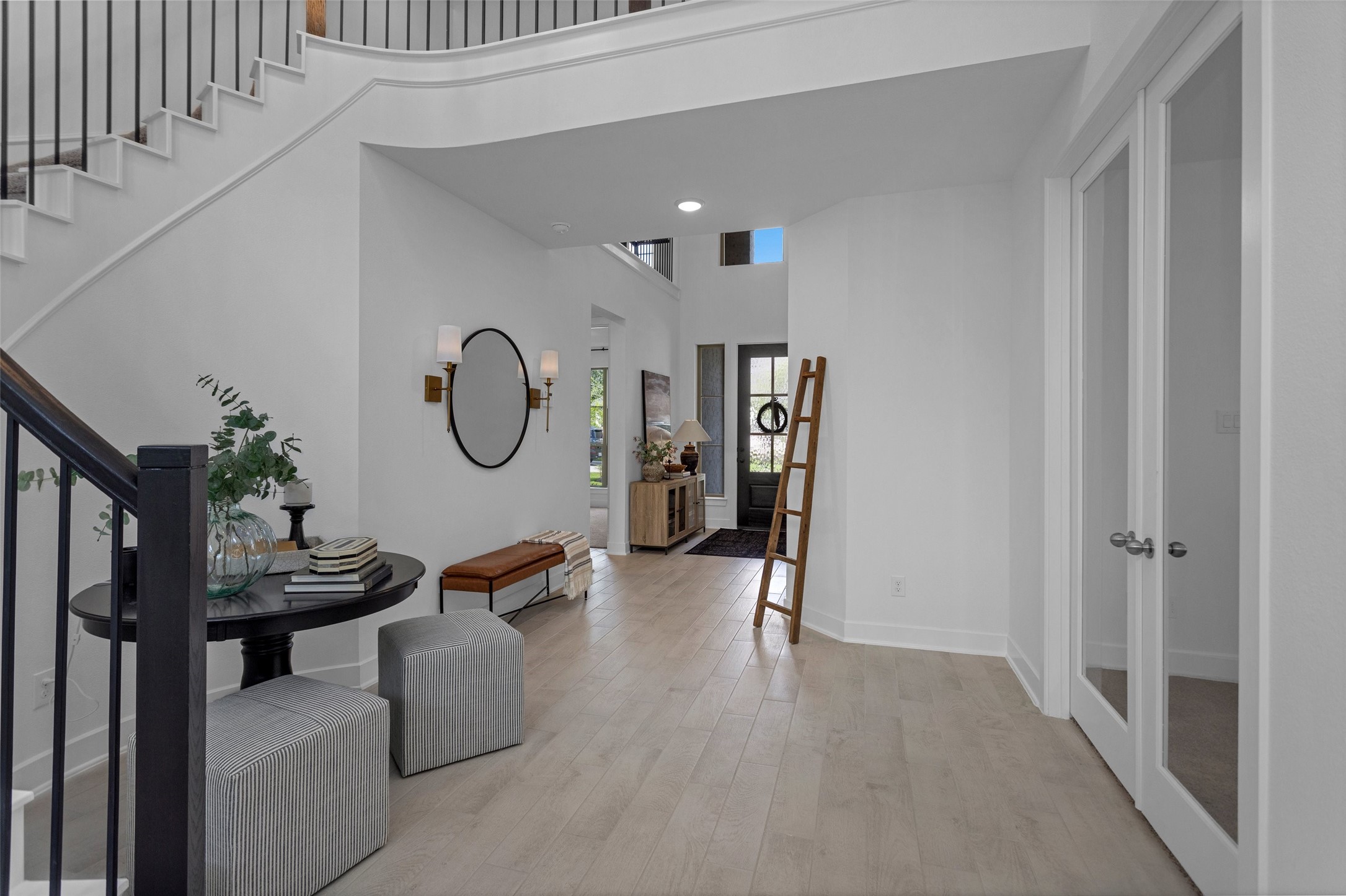 108 Stephens Rdg Lane Montgomery, TX 77316 - Photo 9 of 50 a living room with furniture a chandelier and a potted plant