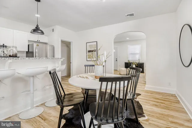 a view of a dining room with furniture