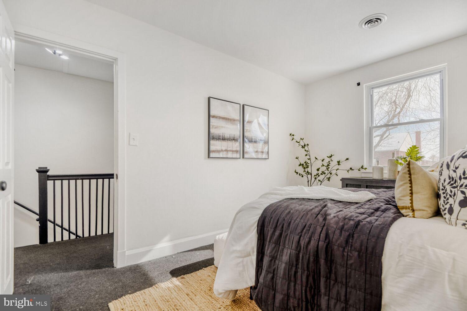 100 Shipway Dundalk, MD 21222 - Photo 16 of 28 a bedroom with a bed and a window