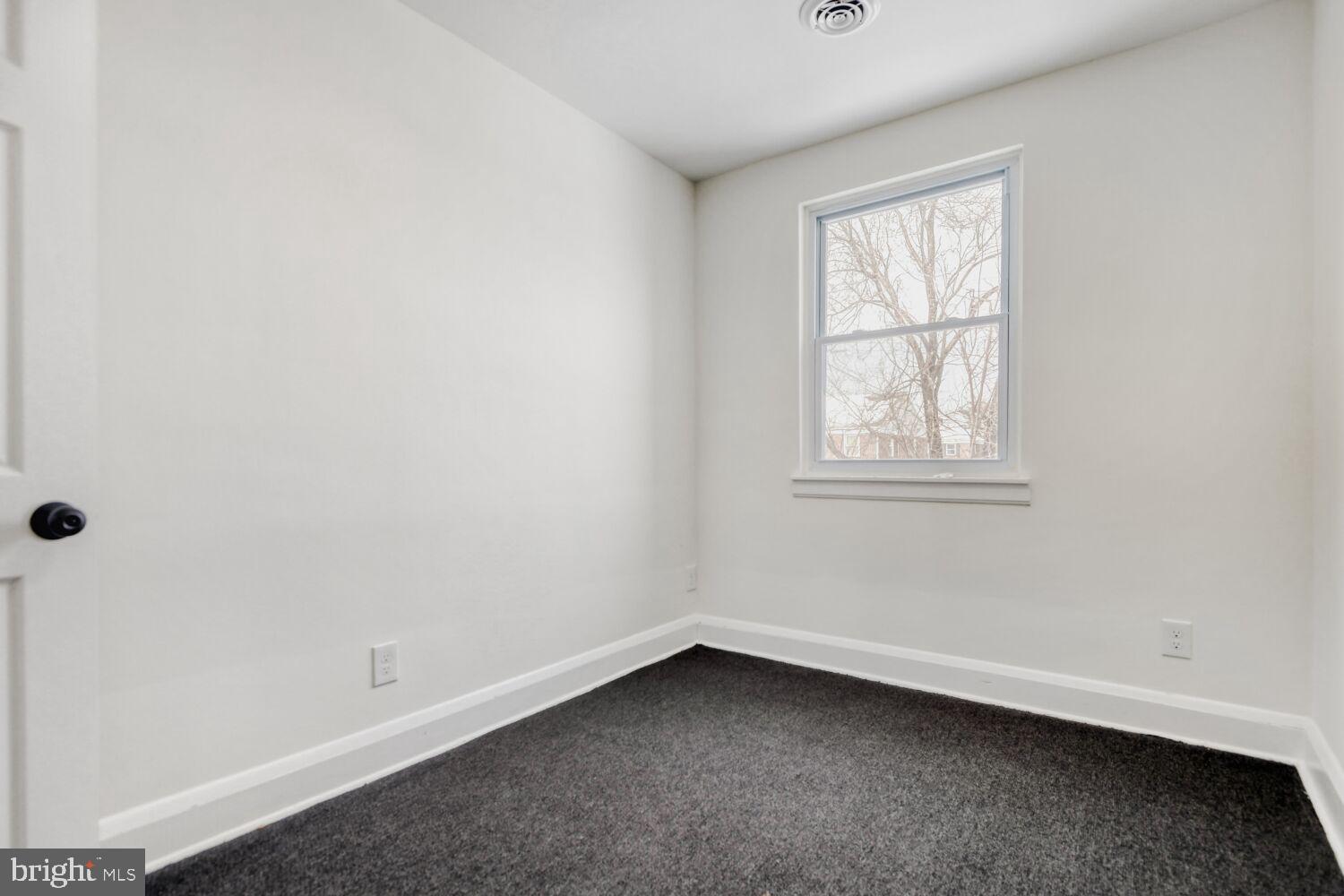 100 Shipway Dundalk, MD 21222 - Photo 21 of 28 an empty room with a window