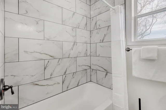 a bathroom with a bathtub