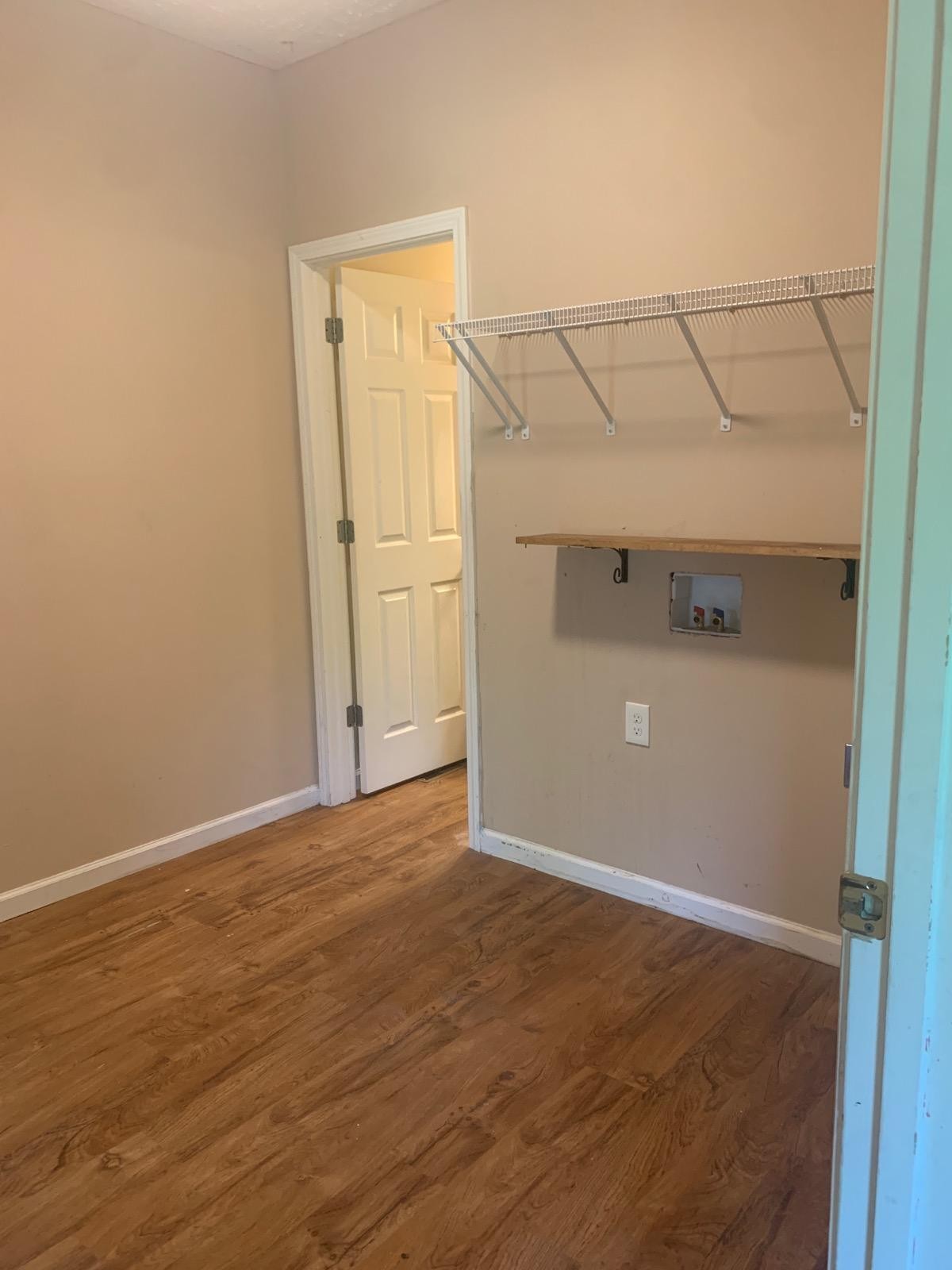 605 South Spring Street Manchester, TN 37355 - Photo 4 of 6 wooden floor in an empty room