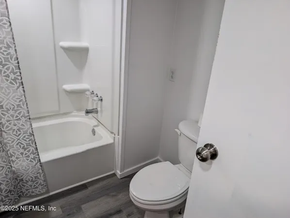 a bathroom with a toilet and a sink