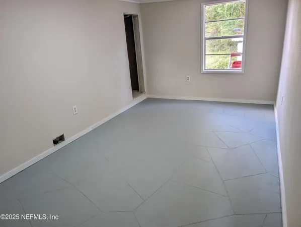 an empty room with windows