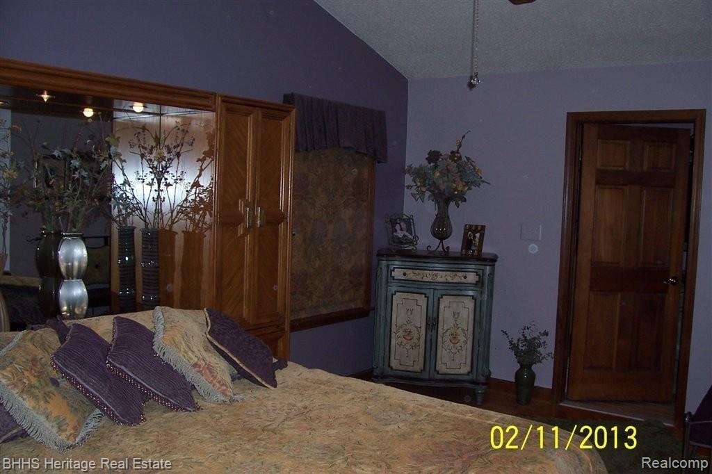 5916 Mason Road Fowlerville, MI 48836 - Photo 16 of 25 Master Bedroom