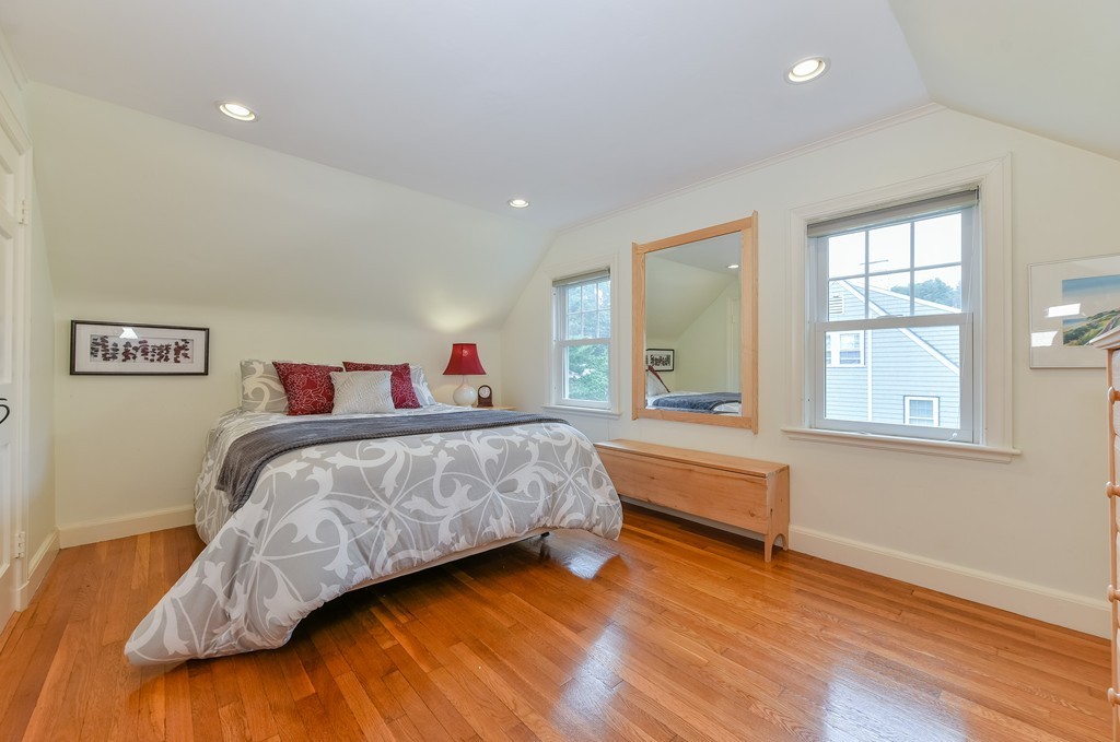 74 Puritan Road Newton, MA 02468 - Photo 14 of 25 a bedroom with a bed and a window