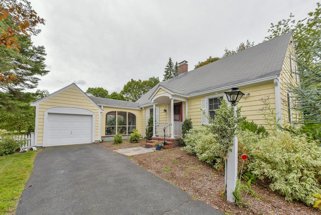 74 Puritan Road Newton, MA 02468 - Photo 19 of 25 front view of a house with a street