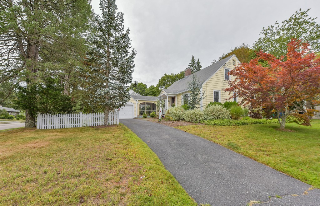 74 Puritan Road Newton, MA 02468 - Photo 20 of 25 a view of a house with pool and a yard