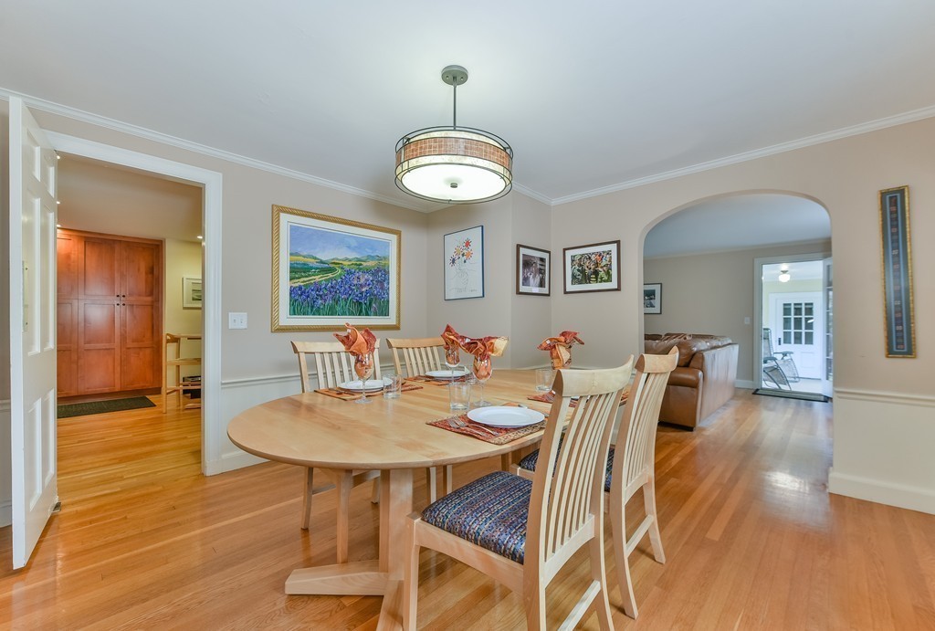 74 Puritan Road Newton, MA 02468 - Photo 7 of 25 a view of a dining room with furniture and wooden floor