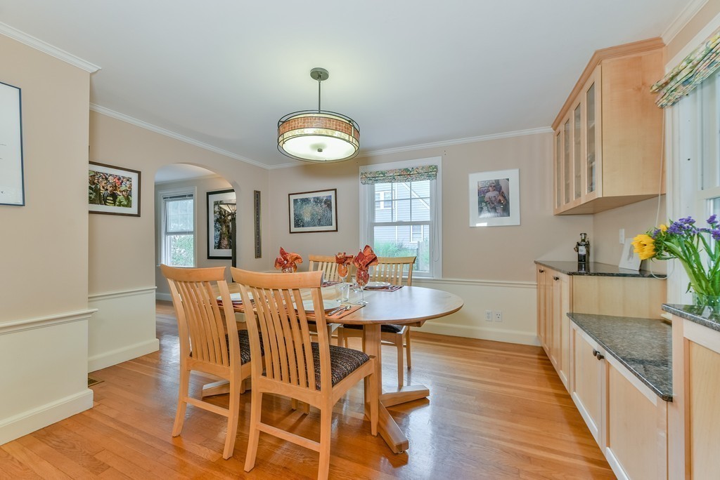 74 Puritan Road Newton, MA 02468 - Photo 8 of 25 a view of a dining room with furniture and wooden floor