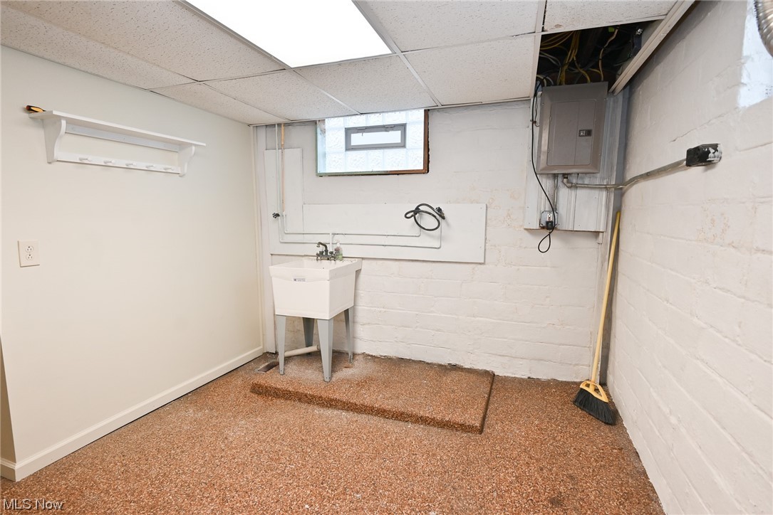 3832 Silsby Road Cleveland, OH 44111 - Photo 18 of 21 Basement with a paneled ceiling and light carpet
