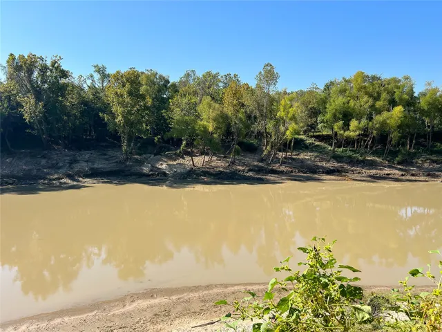 a view of a yard with an outdoor space