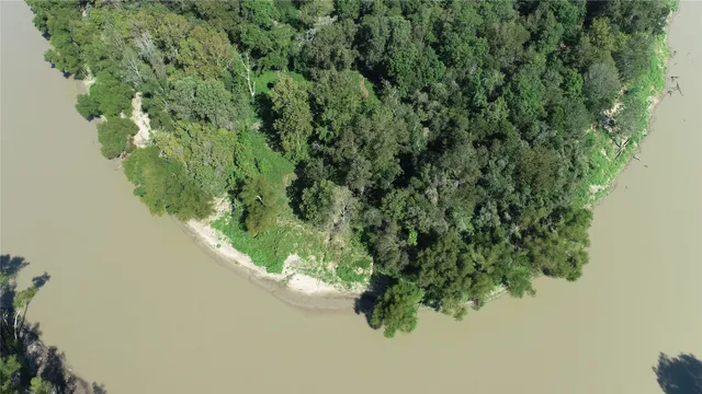 a view of swimming pool from a back yard