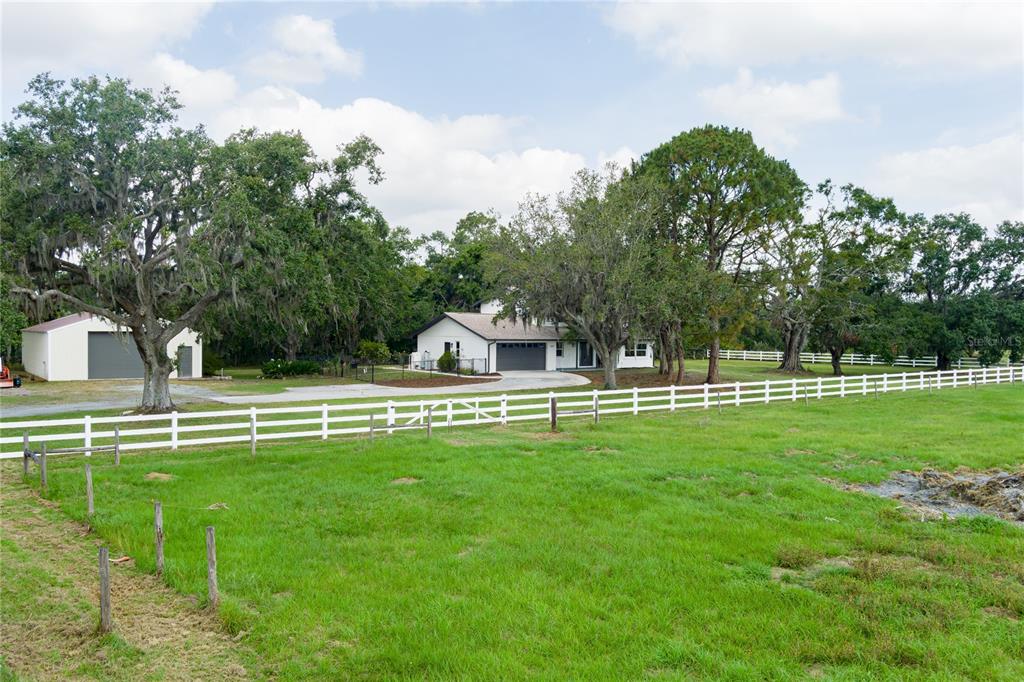 5403 Red Rooster Road Parrish, FL 34219 - Photo 1 of 1 a view of a park with large trees