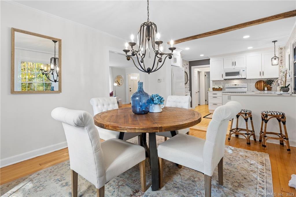 397-2 Hamburg Road Lyme, CT 06371 - Photo 1 of 1 a view of a dining room furniture and chandelier