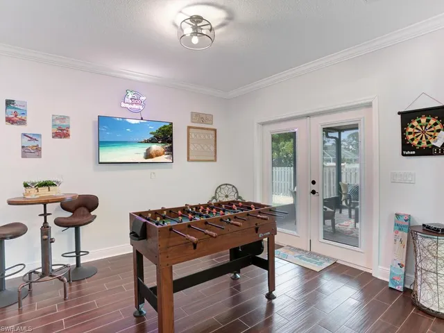 a living room with furniture and a table