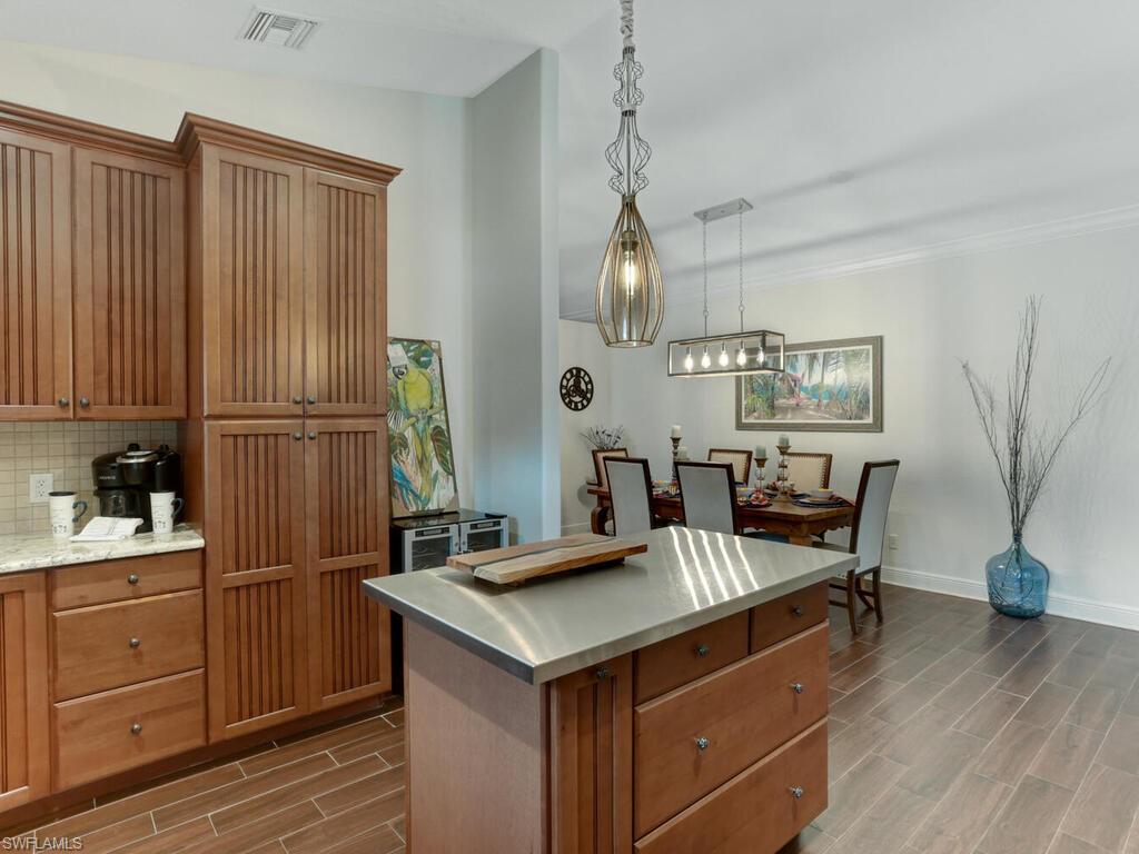 783 92nd Avenue North Naples, FL 34108 - Photo 8 of 32 a view of kitchen with breakfast area