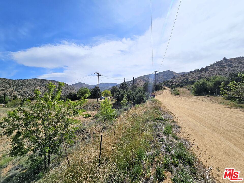22505 Valley View Drive Tehachapi, CA 93561 - Photo 16 of 28 a view of a lake with mountains in the background