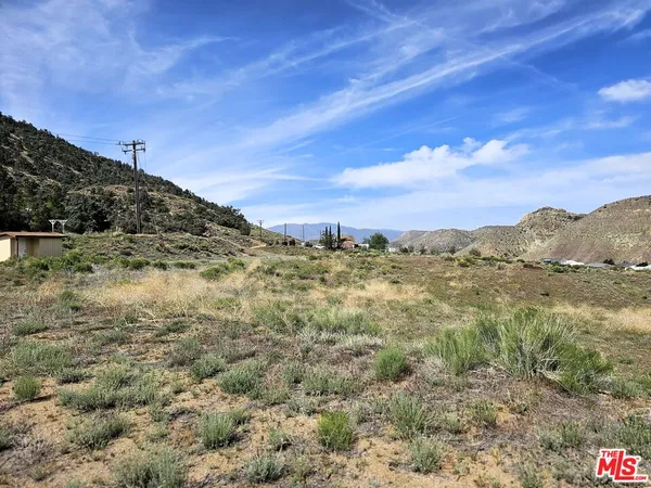 a view of mountains and valleys