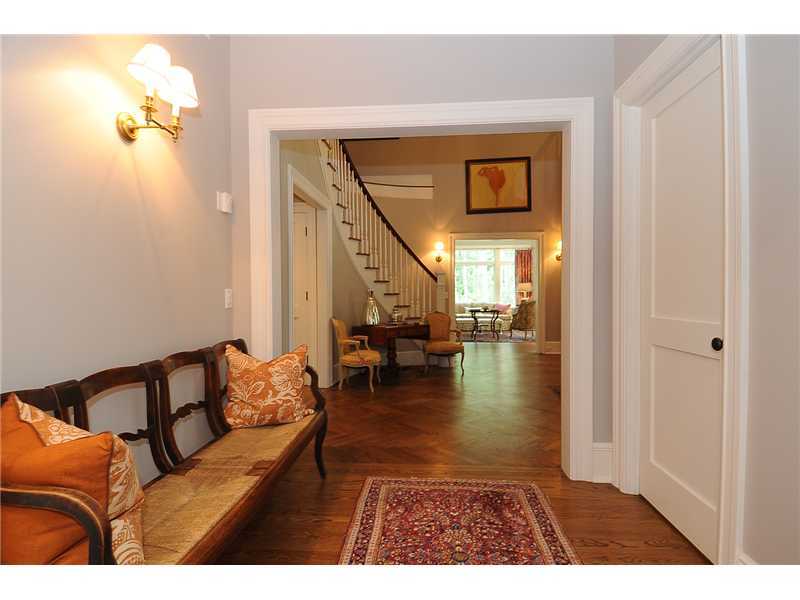 76 Hanson Road Darien, CT 06820 - Photo 11 of 25 a living room with furniture and a painting