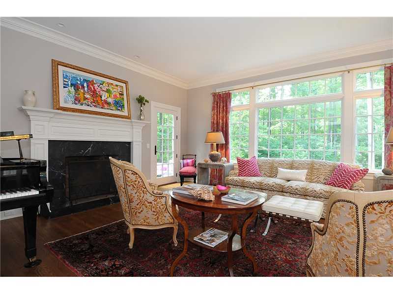 76 Hanson Road Darien, CT 06820 - Photo 12 of 25 a living room with furniture and a fireplace