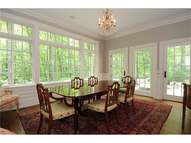 76 Hanson Road Darien, CT 06820 - Photo 15 of 25 a view of a dining room with furniture window and outside view