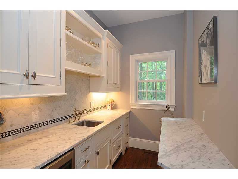 76 Hanson Road Darien, CT 06820 - Photo 16 of 25 a kitchen with a sink cabinets and window