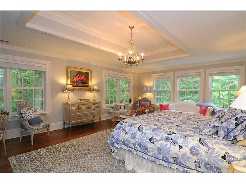 76 Hanson Road Darien, CT 06820 - Photo 17 of 25 a living room with furniture and a chandelier