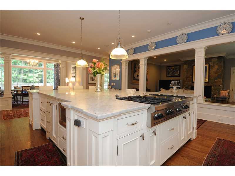 76 Hanson Road Darien, CT 06820 - Photo 4 of 25 a kitchen with stainless steel appliances granite countertop a sink and a stove