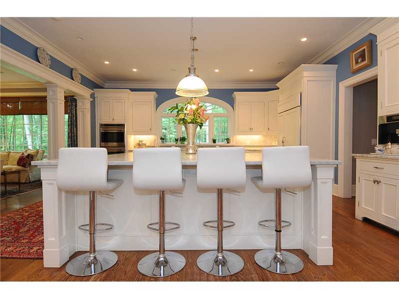 76 Hanson Road Darien, CT 06820 - Photo 7 of 25 a view of a dining room with furniture window and wooden floor