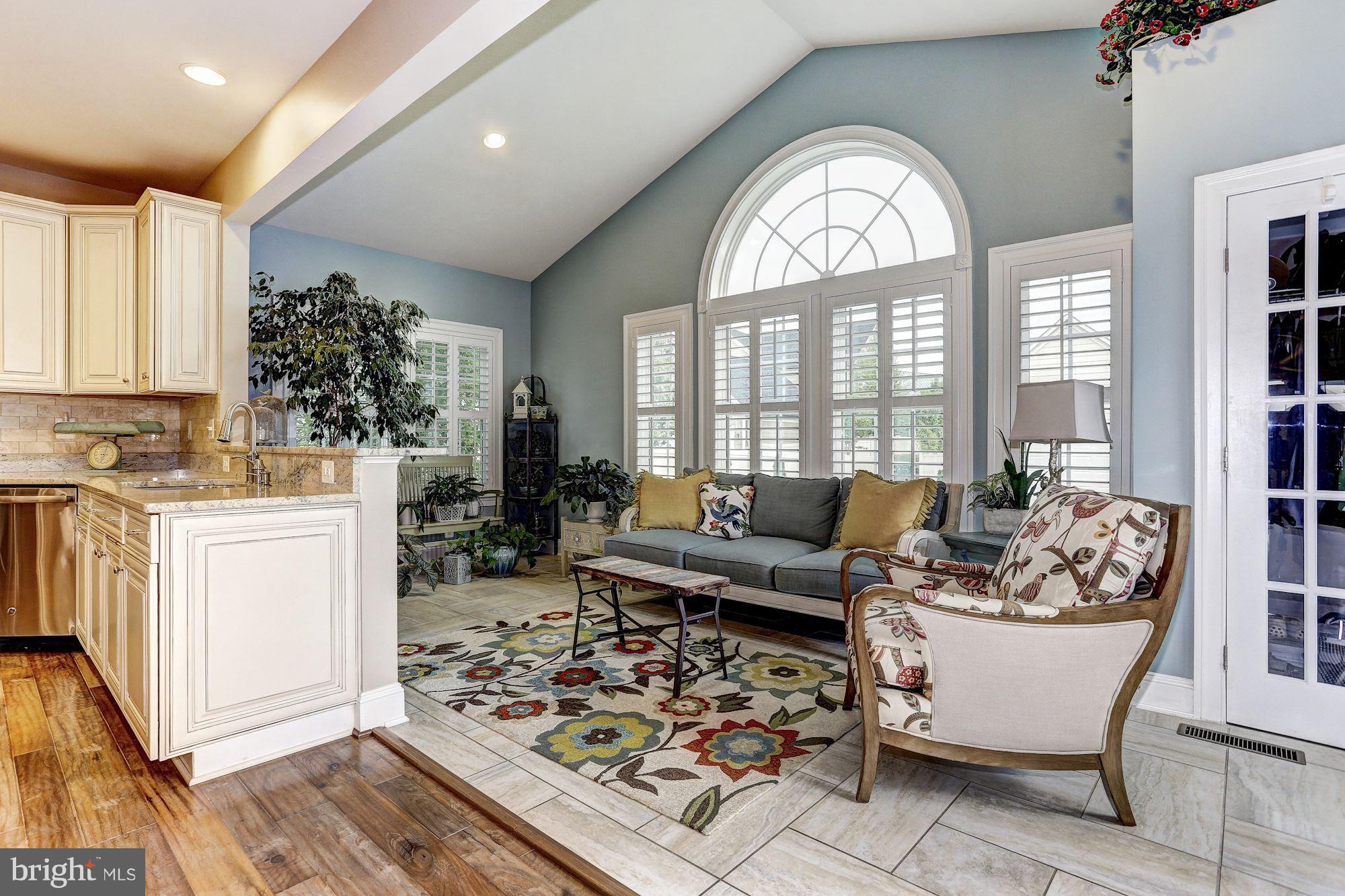7806 Blue Ribbon Street Fulton, MD 20759 - Photo 9 of 30 a living room with furniture and a large window