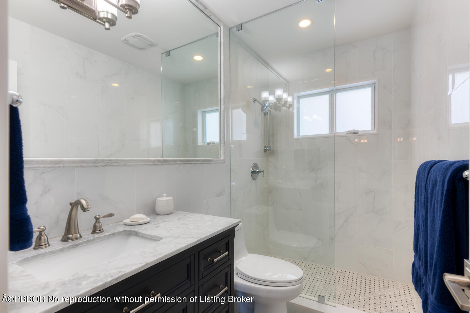 6408 Washington Road West Palm Beach, FL 33405 - Photo 14 of 19 a bathroom with a granite countertop sink a toilet a mirror and shower