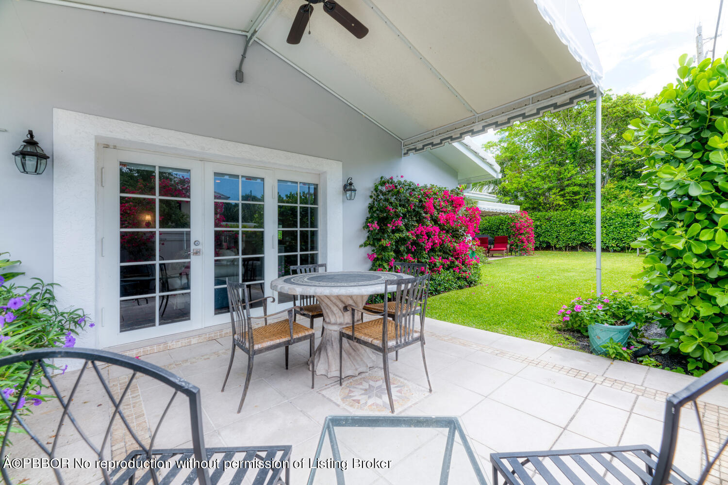 6408 Washington Road West Palm Beach, FL 33405 - Photo 15 of 19 a outdoor space with a table and chairs