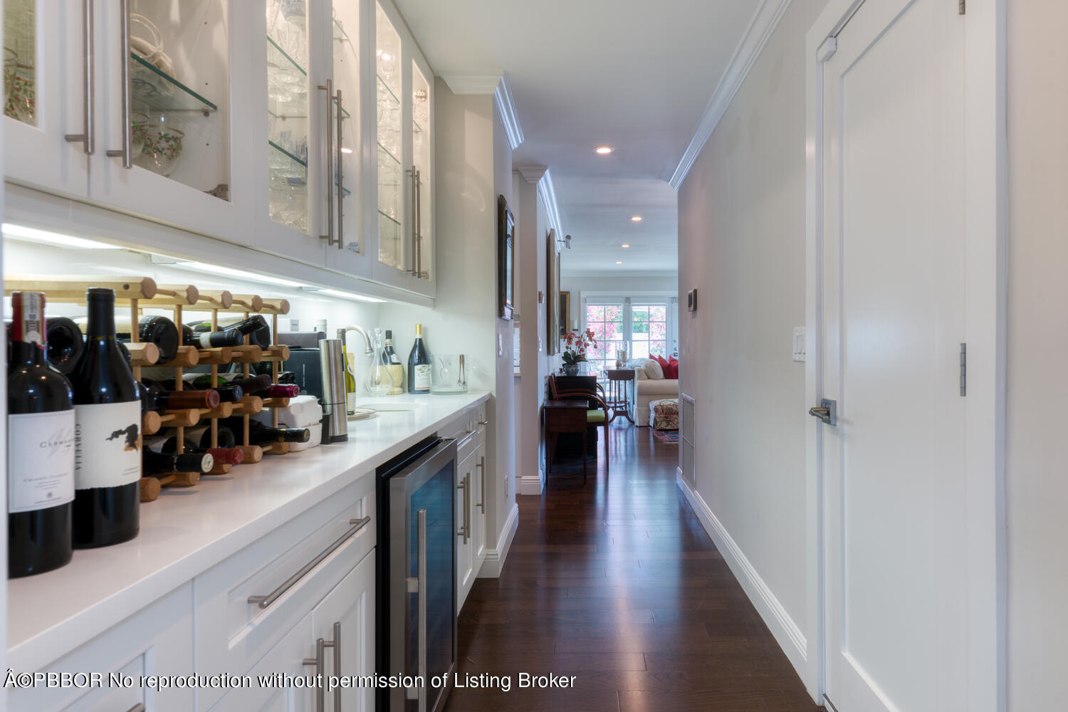 6408 Washington Road West Palm Beach, FL 33405 - Photo 9 of 19 a view of a hallway with dining area and chandelier