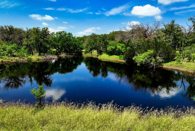 a room with a chair and a window