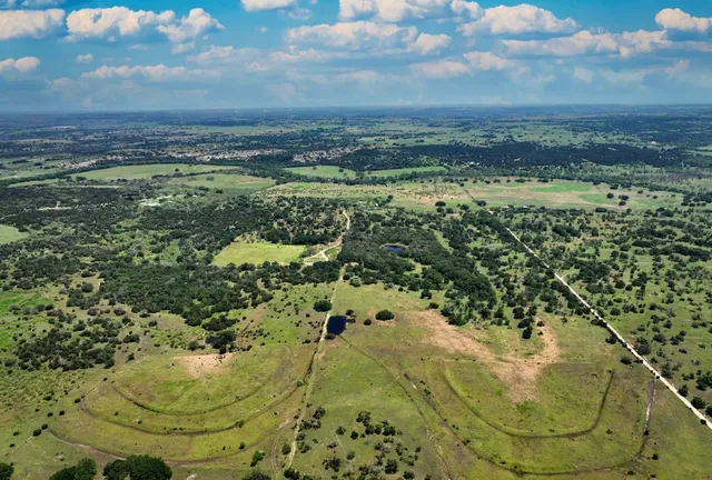 a view of a lake with a city