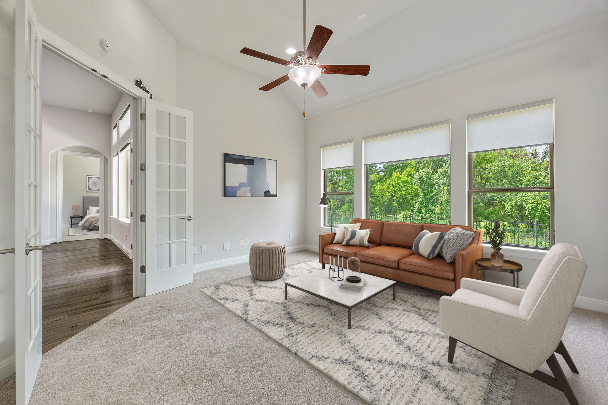 2709 Steece Way Leander, TX 78641 - Photo 22 of 39 a living room with furniture and a large window with garden view