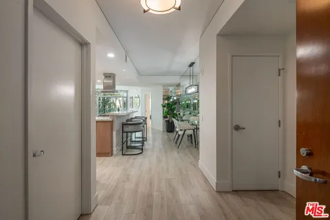 a view of livingroom with furniture and hardwood floor