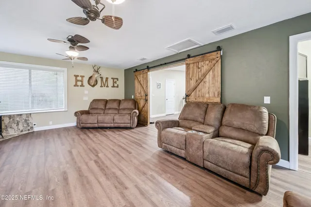 a view of a workspace with furniture and toys