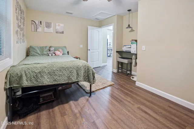 a storage room with wooden floor