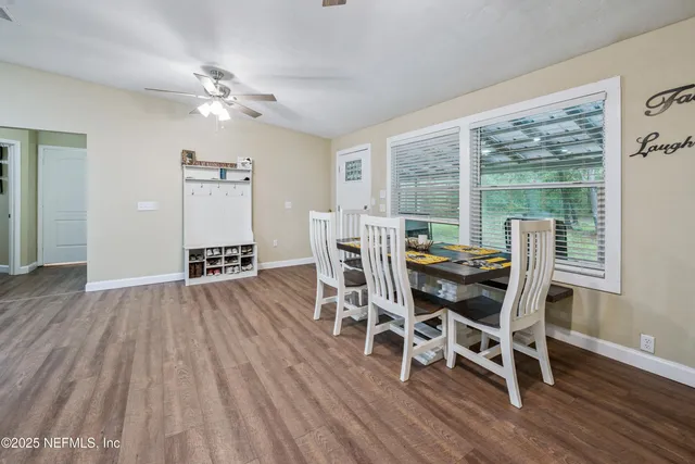 a kitchen with stainless steel appliances a refrigerator and a stove top oven